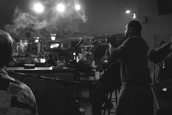 The Strange Appeal of Old Bars, Cigars and Jazz Music